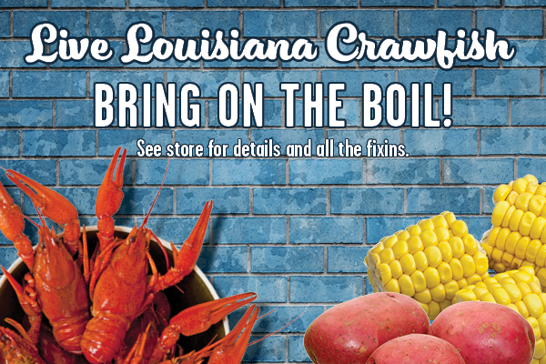 A graphic feature with a blue-brick background as well as crawfish and fixins pictured in the corners. The text reads "Live Louisiana Crawfish. Bring on the boil!"