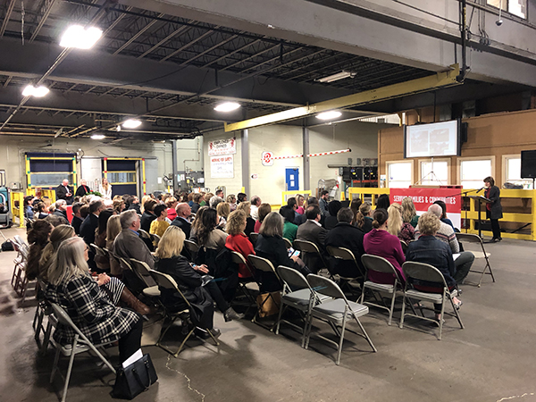 Sally Alvis (Director of Marketing) speaking to the 2019 BBCF recipients at the awarding ceremony in the warehouse.